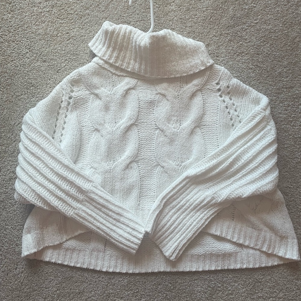 Cropped white turtleneck sweater